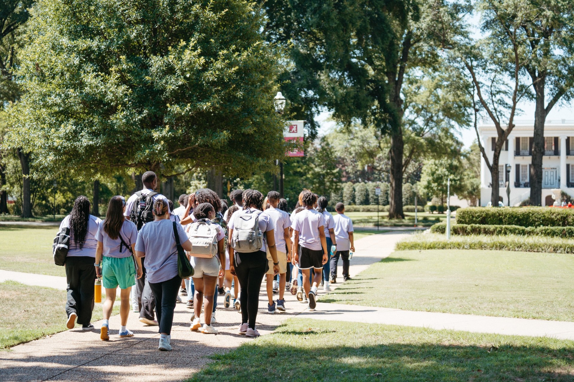 Students walking across the University of Alabama campus