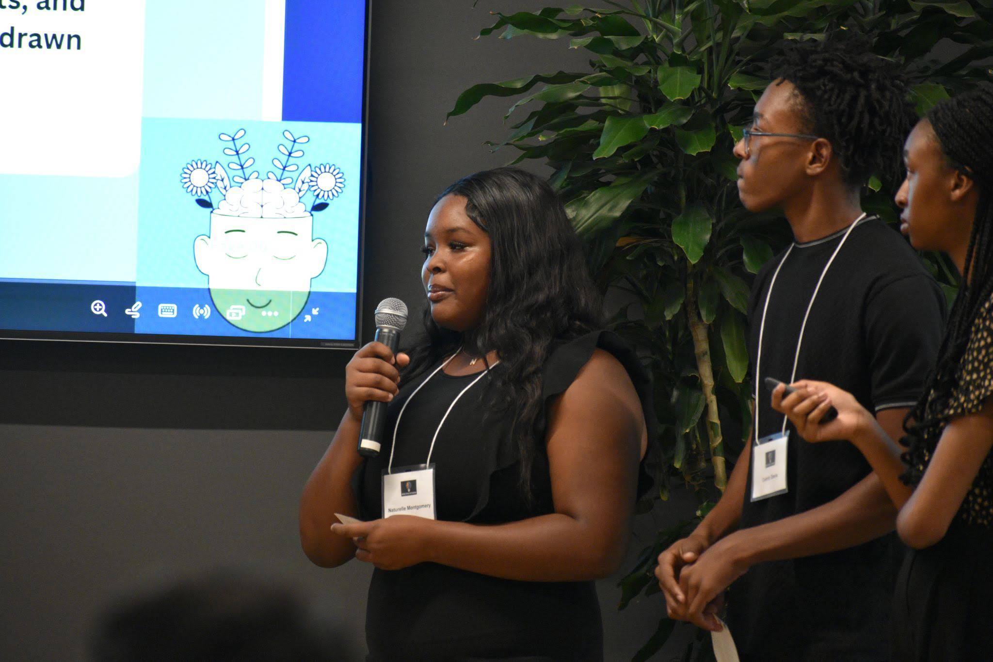High school students pitching a venture at Startup Weekend